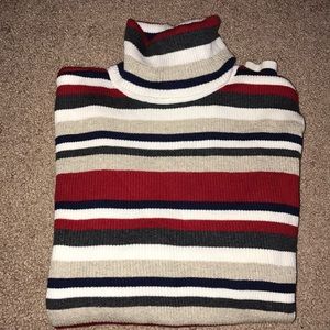 Turtle neck sweater.